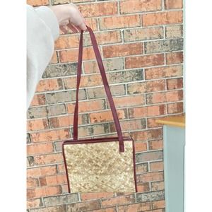 Wicker/straw shoulder bag with maroon trim